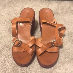 Leather and suede platform sandals.